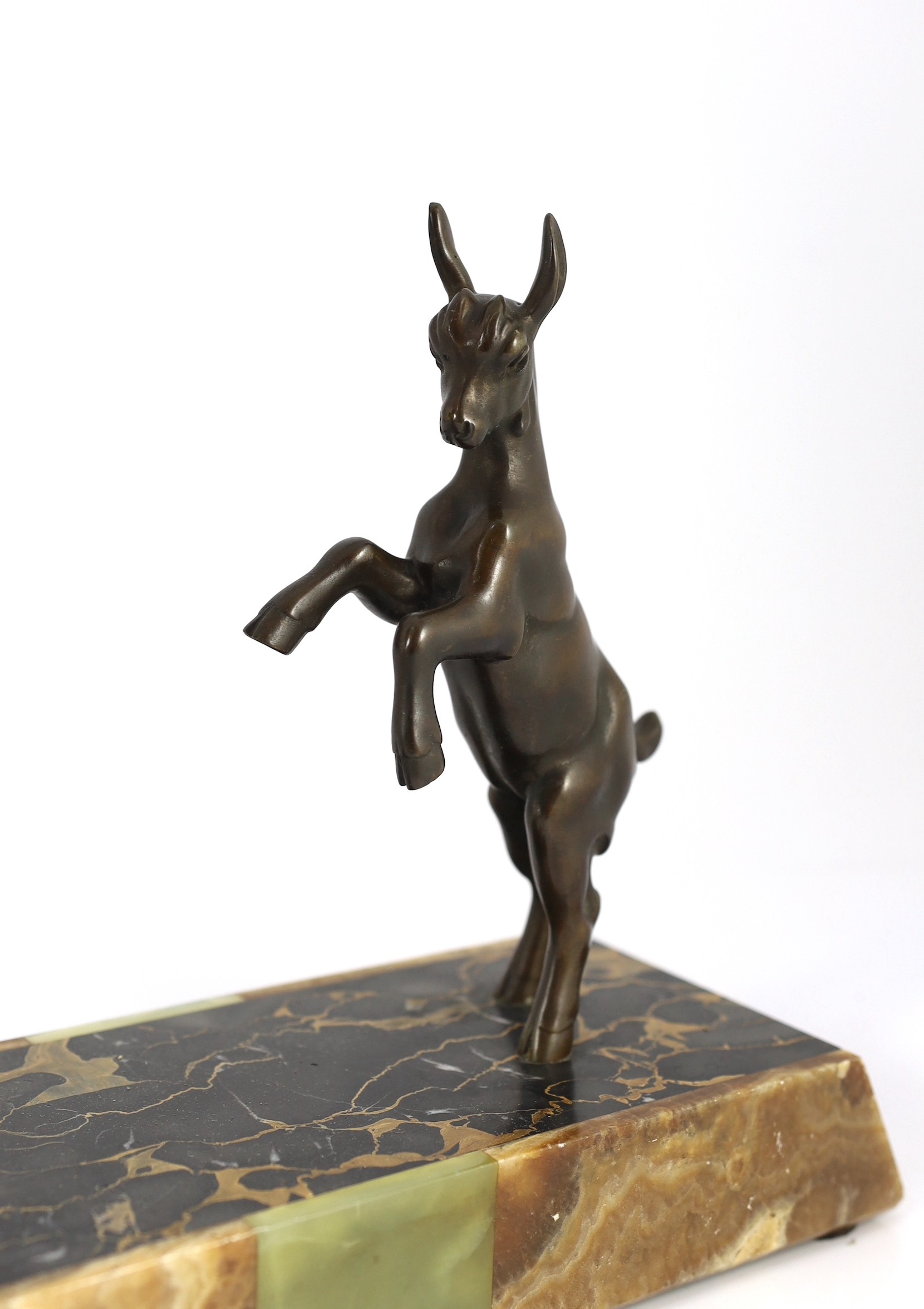 Emile Carlier. A French Art Deco bronze and marble group of a toga dancer with a kid, 71cm wide, 46cm high